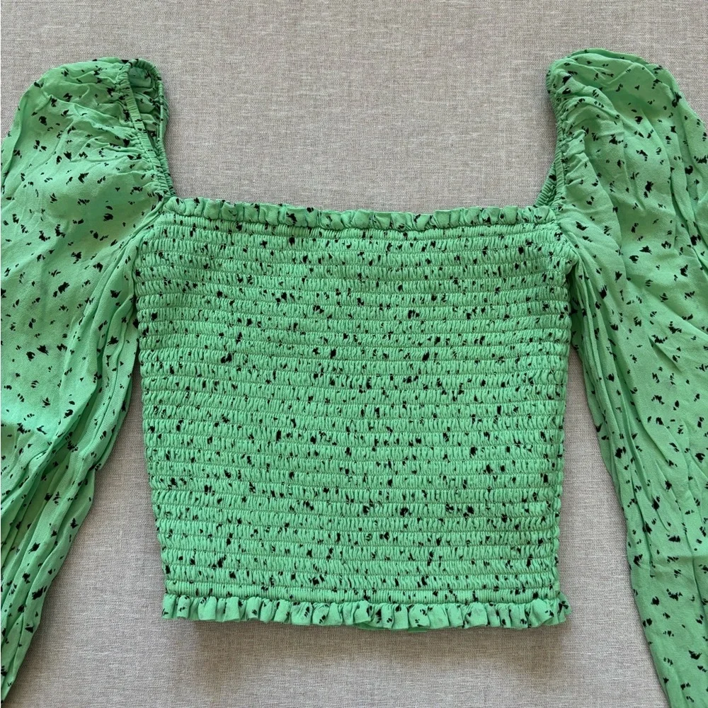 Aritzia green cropped chiffon top.